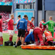 Trainers and medics work on Denmark’s Christian Eriksen after he collapsed on the pitch during Saturday’s match with Finland.